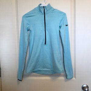Blue Nike woman’s half zip